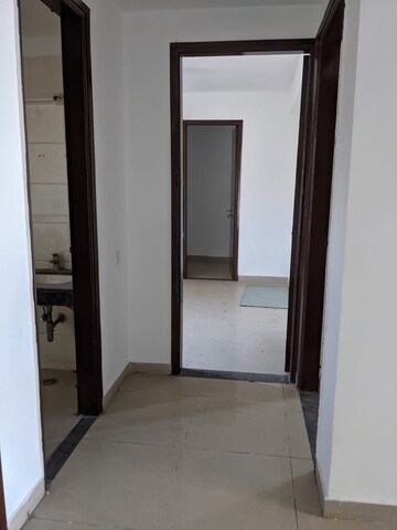 Building Lobby in 4 BHK Apartment at Hanumant Bollywood Heights-2, Dhakoli Village – for Sale