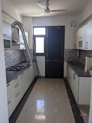 Kitchen in 4 BHK Apartment at Hanumant Bollywood Heights-2, Dhakoli Village – for Sale