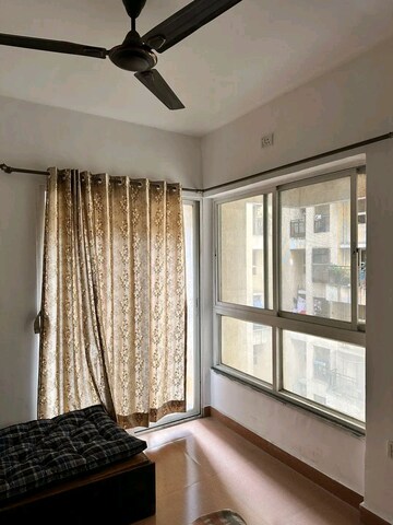 Living Room in 2 BHK Apartment at West Avenue CHS, Nalasopara West – for Sale