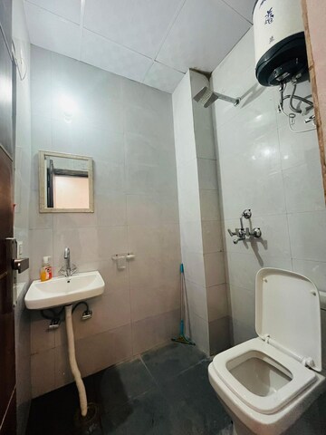 Bathroom in 1 BHK Builder Floor at Ansal Sushant Lok I, Sector 43 – for Rent
