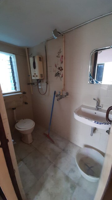 Bathroom in 2 BHK Apartment at Vile Parle West – for Rent