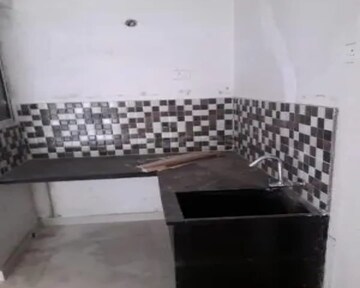 Kitchen in 2 BHK Apartment at Swapno Puron, Amtala – for Sale