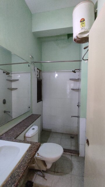 Bathroom in 3 BHK Apartment at Moti Nagar – for Sale