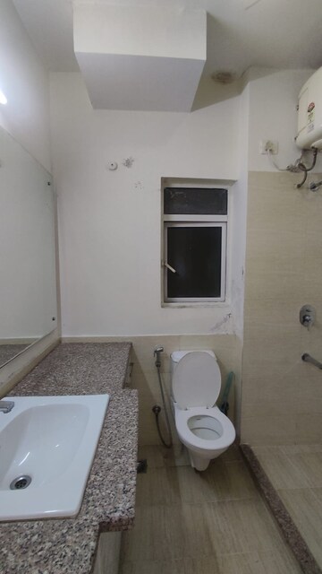 Bathroom in 3 BHK Apartment at Moti Nagar – for Sale