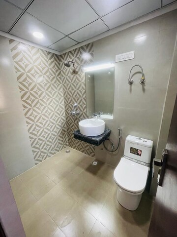 Bathroom in 2 BHK Apartment at JKG Palm Resort, Raj Nagar Extension – for Rent