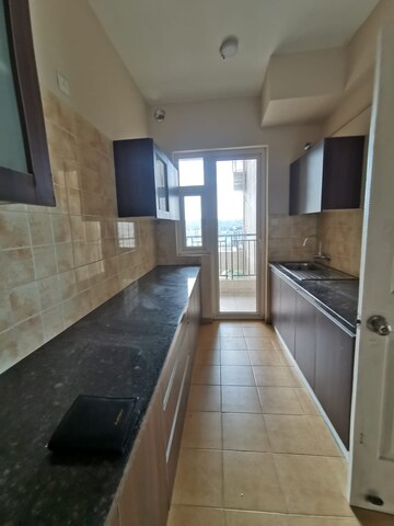 Kitchen in 2 BHK Apartment at Ashiana Mulberry, Sohna Sector 2 – for Rent