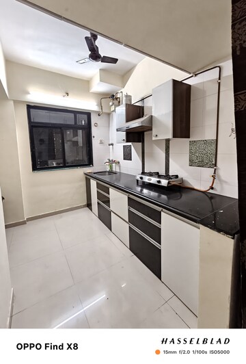 Kitchen in 2 BHK Apartment at Puranik City Phase II, Ghodbunder Road – for Rent