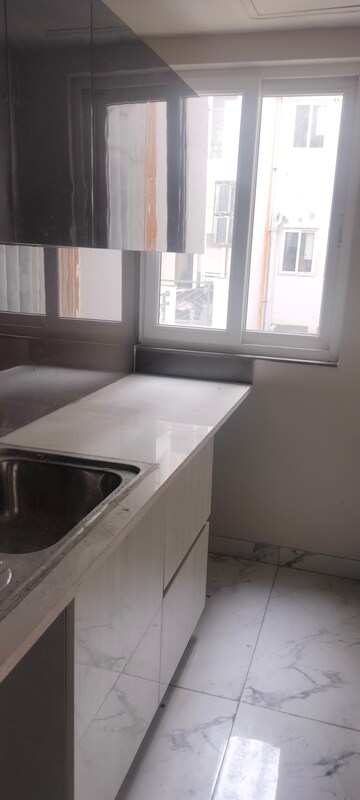 Kitchen in 2.5 BHK Builder Floor at Central Park Cerise Suites, Sohna Sector 33 – for Rent