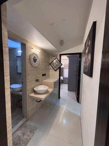 Bathroom in 2 BHK Apartment at Transcon Flora Heights, Andheri West – for Rent