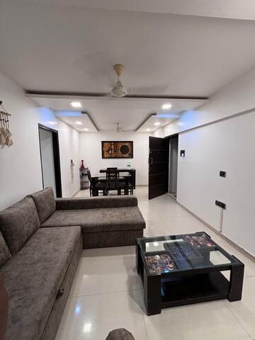 Living Room in 2 BHK Apartment at Transcon Flora Heights, Andheri West – for Rent