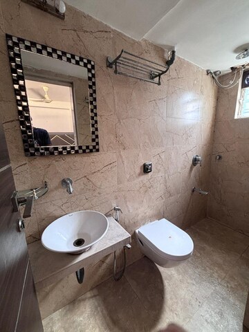 Bathroom in 2 BHK Apartment at Transcon Flora Heights, Andheri West – for Rent