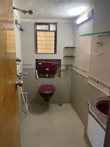 Bathroom in 2 BHK Apartment at Nishant Building, Andheri West – for Rent