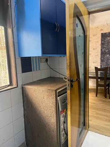 Living Room in 2 BHK Apartment at Nishant Building, Andheri West – for Rent