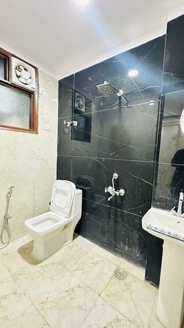 Bathroom in 2 BHK Builder Floor at Chattarpur – for Rent