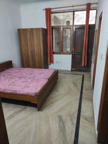 Bedroom in 1 BHK Builder Floor at RWA Apartments Sector 26, Sector 26 – for Rent