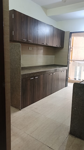 Kitchen in 3 BHK Apartment at HDIL Metropolis Residences, Andheri West – for Rent