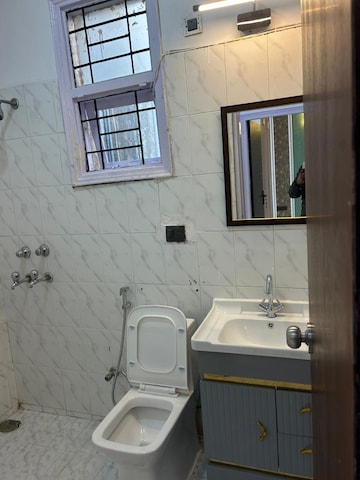 Bathroom in 2 BHK Builder Floor at Hong Kong Bazaar, Sector 57 – for Sale