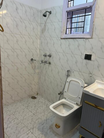 Bathroom in 2 BHK Builder Floor at Hong Kong Bazaar, Sector 57 – for Sale
