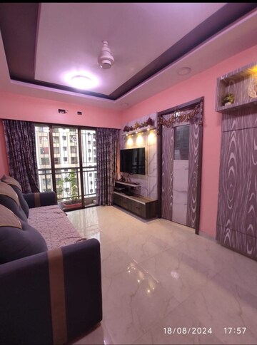 Living Room in 1 BHK Apartment at Sunteck West World, Naigaon East – for Rent