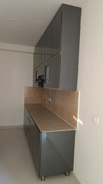 Kitchen in 3 BHK Apartment at Pardos Okas Residency, Sushant Golf City – for Sale