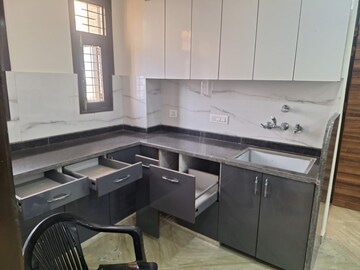 Kitchen in 2 BHK Apartment at Rohini Sector 18 – for Rent
