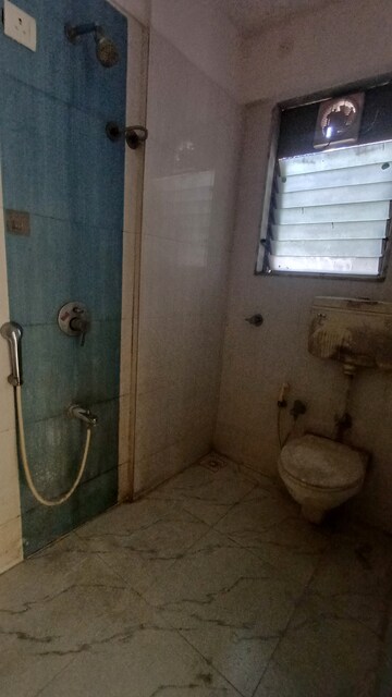 Bathroom in 1.5 BHK Apartment at Prabhat Upvan CHS, Gawand Baug – for Rent