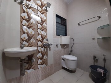 Bathroom in 2 BHK Apartment at AMI Jharna, Goregaon East – for Rent