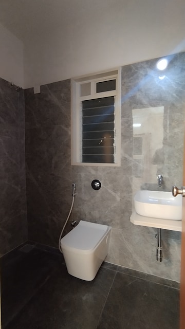 Bathroom in 3 BHK Apartment at Triveni Pearl, Khadakpada – for Sale