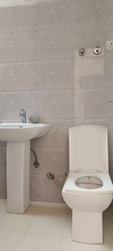 Bathroom in 2 BHK Apartment at Ace City, Sector 1 Greater Noida – for Rent