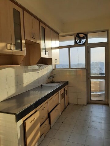 Kitchen in 2 BHK Apartment at Ansal Sushant Estate, Sector 52 – for Rent