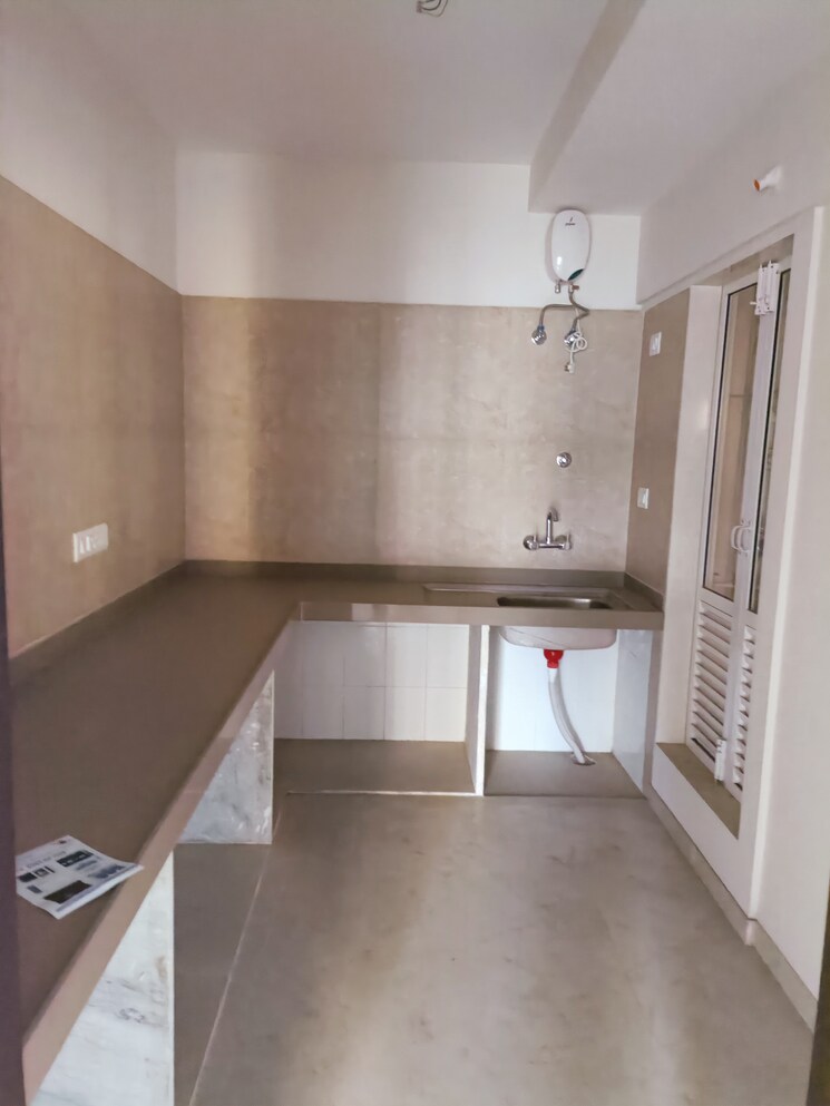 Kitchen, dosti-west-county 2 Bedroom 650 Sq.Ft. Apartment In Balkum Pada Thane 8155560