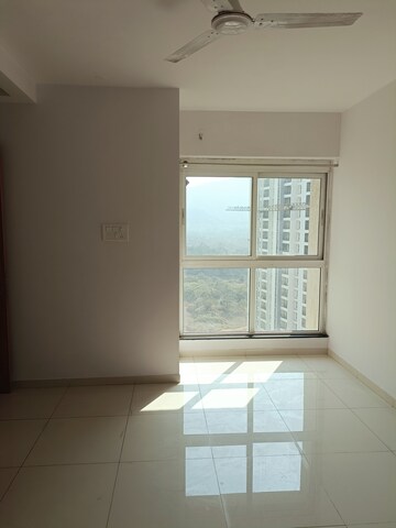 Room in 1.5 BHK Apartment at Godrej Emerald, Ghodbunder Road – for Sale