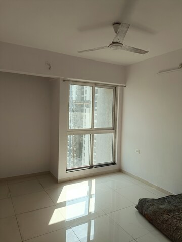 Room in 1.5 BHK Apartment at Godrej Emerald, Ghodbunder Road – for Sale
