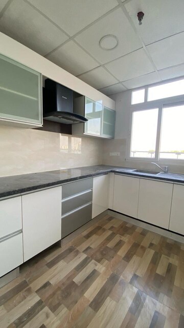 Kitchen in 2.5 BHK Apartment at Ansal Sushant Golf city, Sushant Golf City – for Rent