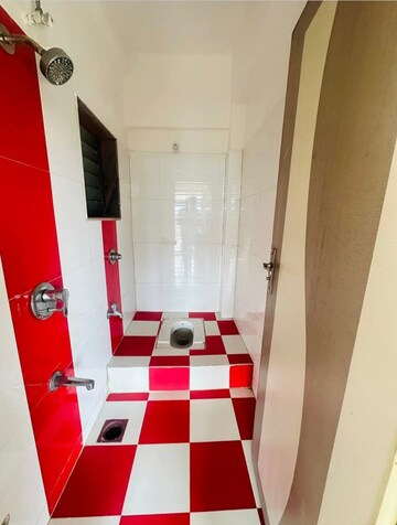Bathroom in 1 BHK Apartment at Pranjee Garden City, Katrap – for Sale
