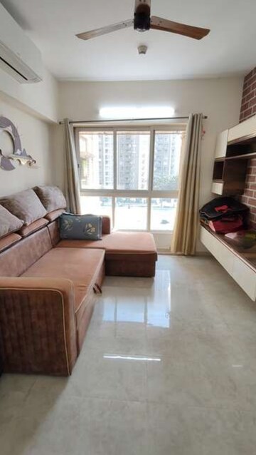 Living Room in 2 BHK Apartment at Lodha Amara, Kolshet Road – for Rent
