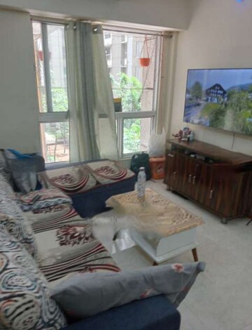 Living Room in 1 BHK Apartment at Lodha Amara, Kolshet Road – for Rent