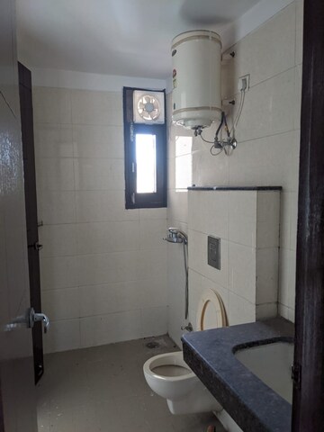Bathroom in 4 BHK Apartment at Hanumant Bollywood Heights-2, Dhakoli Village – for Sale