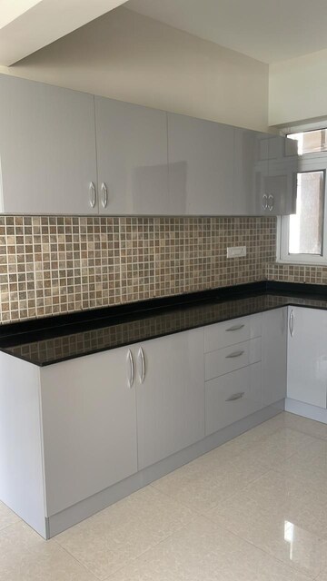 Kitchen in 3 BHK Apartment at SJR Blue Waters, Off Sarjapur Road – for Rent