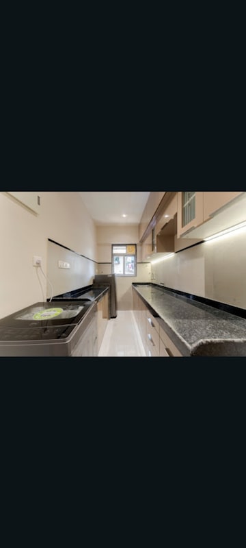 Kitchen in 2 BHK Apartment at Shreenath Aai Satidevi Paradise, Mulund West – for Sale