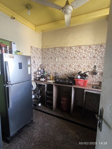 Kitchen in 1 BHK Apartment at Royal Palms, Goregaon East – for Rent
