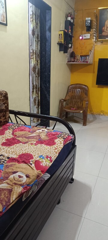 Bedroom in 1 RK Apartment at Raut Baug Housing Complex, Dhankawadi – for Rent