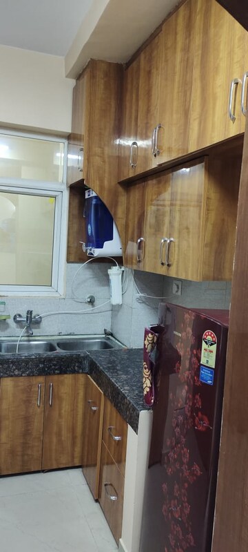 Kitchen in 2.5 BHK Apartment at Logix Blossom Greens, Sector 143 – for Rent