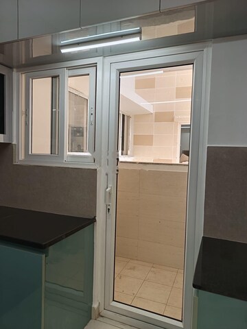 Kitchen in 2.5 BHK Apartment at Ambience Courtyard, Manikonda – for Rent