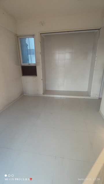 Room in 2 BHK Apartment at Vijay Galaxy, Waghbil – for Sale