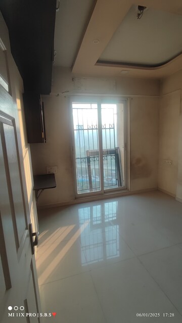Room in 2 BHK Apartment at Vijay Galaxy, Waghbil – for Sale