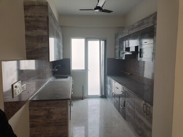 Kitchen in 3 BHK Apartment at Antriksh Golf View, Sector 78 – for Rent