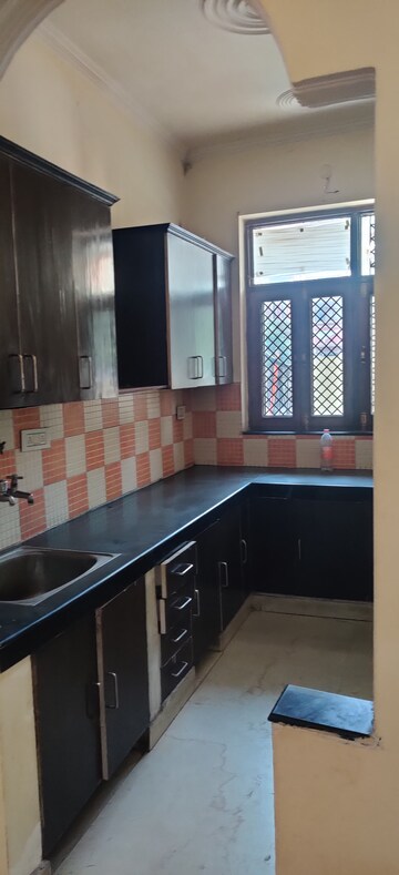 Kitchen in 2.5 BHK Builder Floor at RPS Paras Apartments, Sector 30 – for Rent