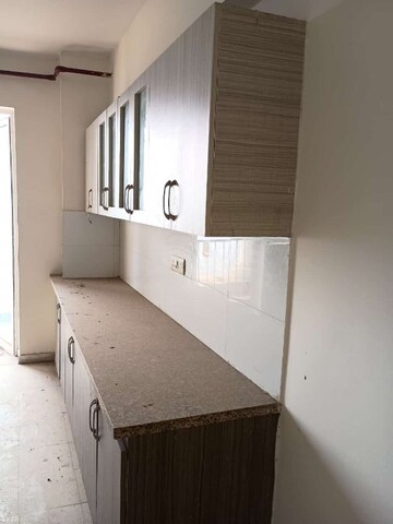 Kitchen in 4 BHK Apartment at DLF New Town Heights I, Sector 90 – for Sale