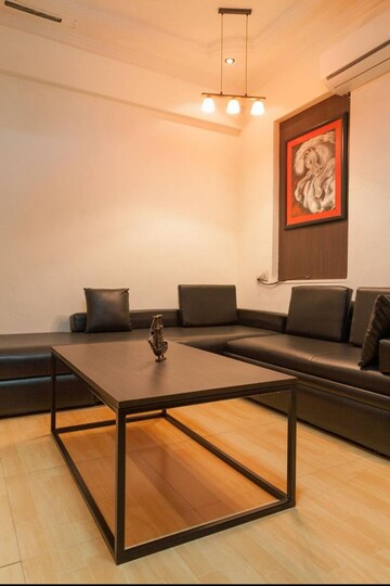 Living Room in 1 BHK Apartment at Tulsi Mahal, Khar West – for Rent